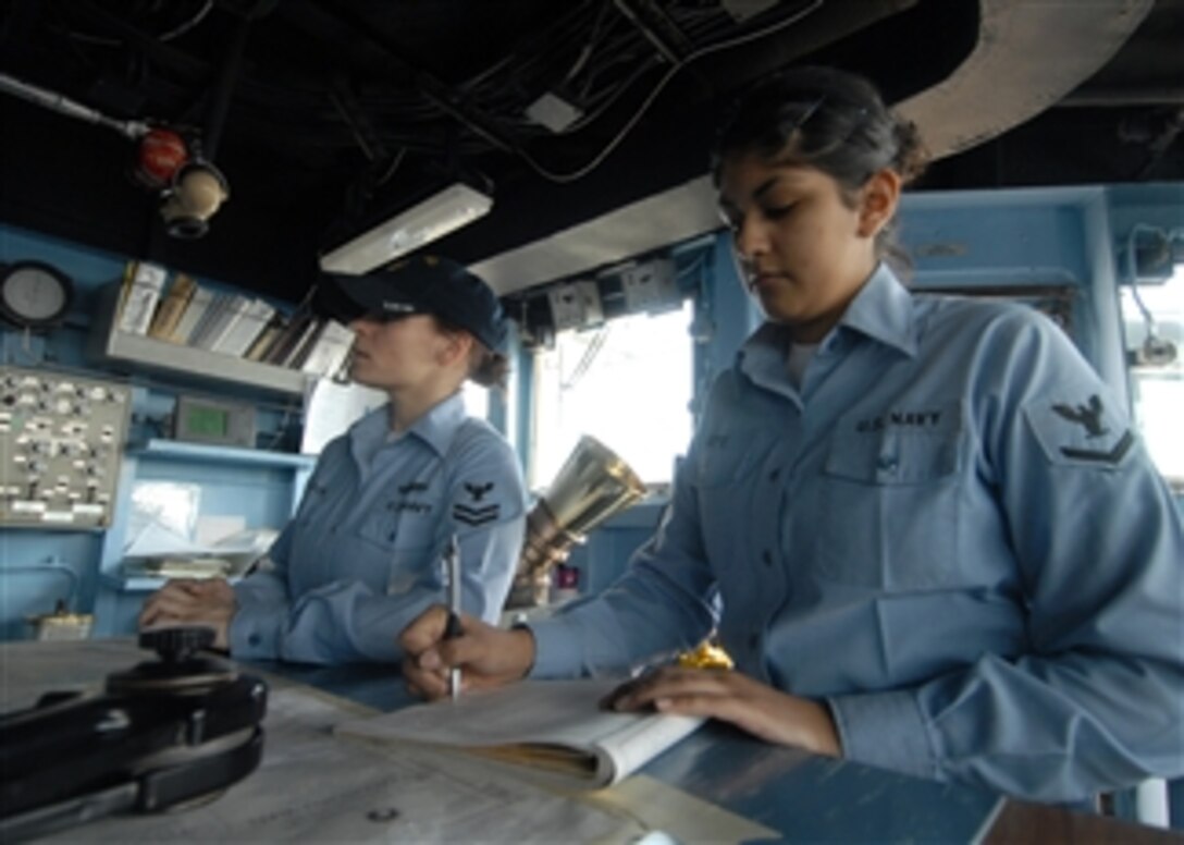 U.S. Navy Petty Officer 3rd Class Crystal Arizpe, assigned to the forward-deployed dock landing ship USS Tortuga (LSD 46), records bearings in the bearing log as the Tortuga prepares to enter port at White Beach Naval Facility Okinawa, Japan, on Jan. 27, 2009.  