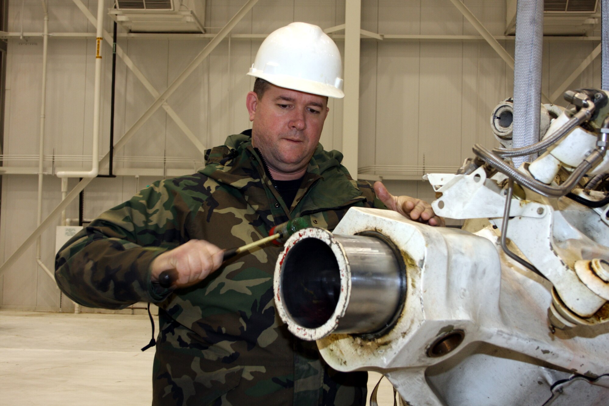 WRIGHT-PATTERSON AFB, Ohio - Staff Sgt. Greg Cyrus, 445th Maintenance Squadron, prepare a broken strut for shipment to the repair depo at Hill Air Force Base. (Air Force photo/Senior Airman Ken LaRock)