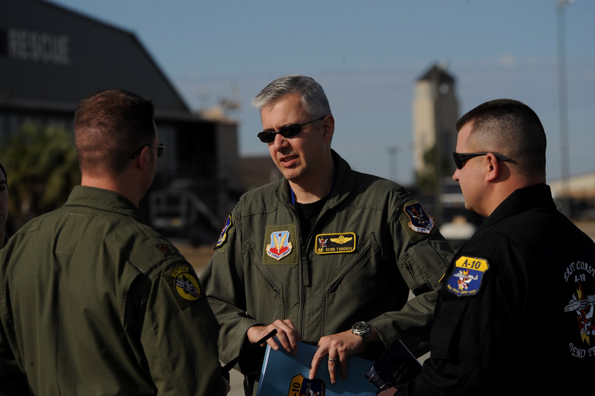 MOODY AIR FORCE BASE, Ga. -- Col. Kenneth Todorov, 23rd Wing commander, speaks to Tech. Sgt. Matthew Harris, A-10 East Coast Demo Team assistant team chief, and Maj. Paul Brown, A-10 West Coast Demo Team pilot, on the team’s performance here Jan. 29. The team performed for Colonel Todorov so they could move on for certification at the 9th Air Force level. (U.S. Air Force photo by Senior Airman Gina Chiaverotti)