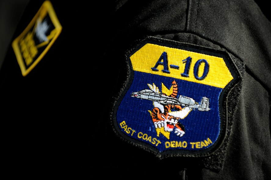 MOODY AIR FORCE BASE, Ga. -- The A-10 East Coast Demo Team patch is proudly worn on Tech. Sgt. Matthew Harris’, A-10 assistant team chief, sleeve here Jan. 29. The team was preparing to perform in front of Col. Kenneth Todorov, 23rd Wing commander. (U.S. Air Force photo by Senior Airman Gina Chiaverotti)