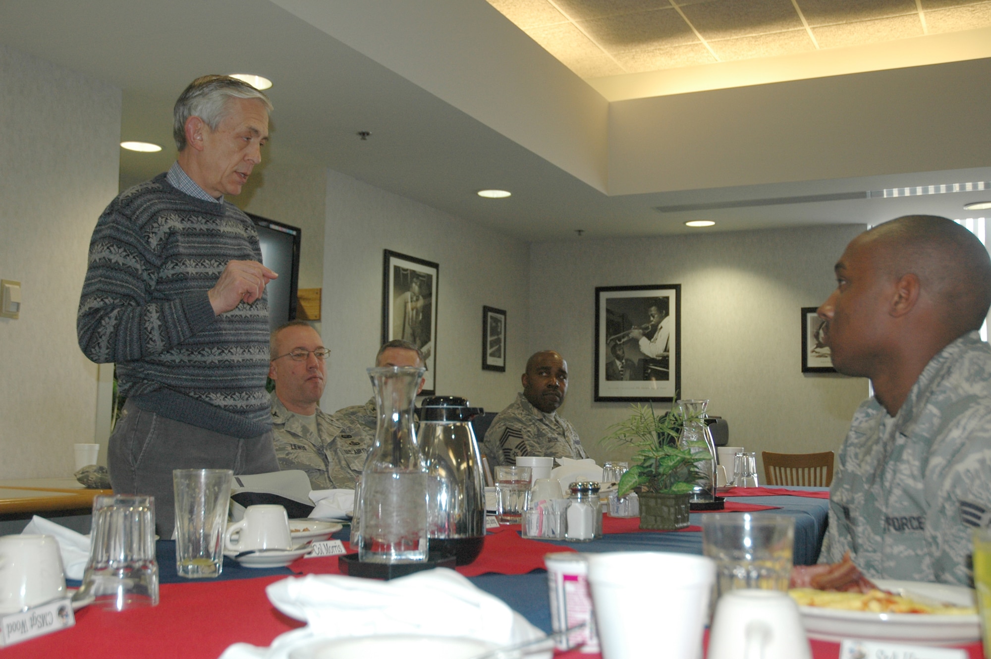 DOVER AIR FORCE BASE, Del. -- Craig W. Duehring, Assistant Secretary of the Air Force for Manpower and Reserve Affairs, visited Dover Air Force Base to talk with Airmen during breakfast at the Patterson Dining Facility Jan. 30. Mr. Duehring also met with 436th and 512th Airlift Wing group commanders and talked with active duty and Reserve Airmen at town halls meetings throughout the day.  He answered  Airmen's questions ranging from sign-on bonuses to ancillary training to Reserve travel vouchers. He is responsible for providing overall supervision of manpower, military and civilian personnel, Reserve component affairs, and readiness support for the Department of the Air Force (U.S. Air Force photo/Senior Airman Andria J. Allmond).