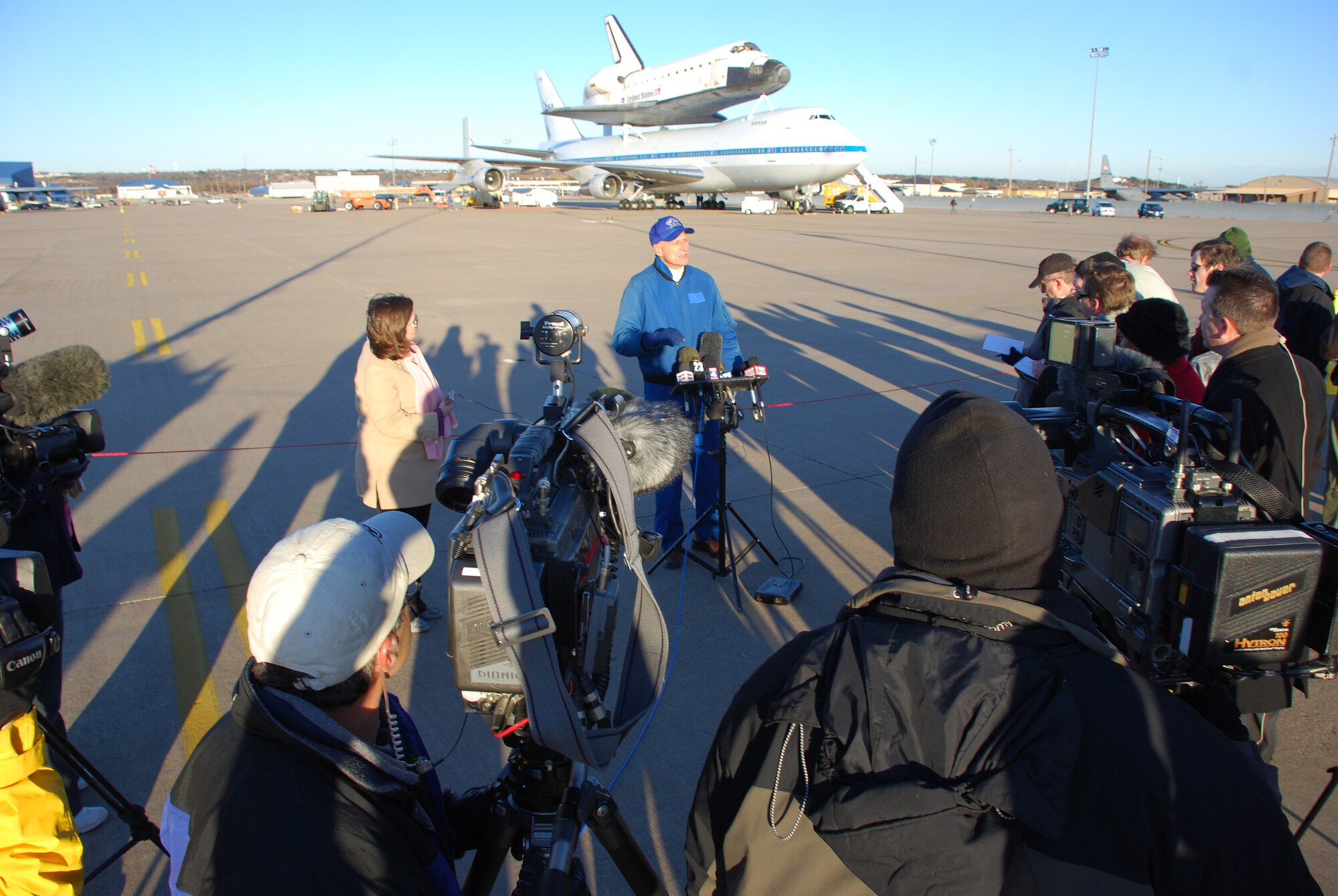 Local news media crews from all over the Dallas/Fort Worth Metroplex showed up to interview the 747 pilots who landed with the shuttle Endeavor at Naval Air Station Joint Reserve Base Fort Worth, Texas, Dec. 10. The last time a modified 747 carrying the space shuttle landed here was in the spring of 1997.  (U.S. Air Force Photo/Tech. Sgt. Julie Briden-Garcia) 