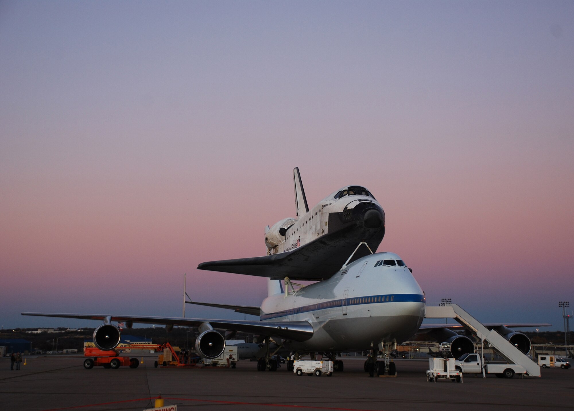 A modified NASA 747 carrying the space shuttle, Endeavor, landed at the Naval Air Station Joint Reserve Base Fort Worth, Texas Dec. 10 for refueling and maintenance before continuing to Barksdale Air Force Base, La., the next day. The last time a modified 747 carrying the space shuttle landed here was in the spring of 1997. (U.S. Air Force Photo/Tech. Sgt. Julie Briden-Garcia)