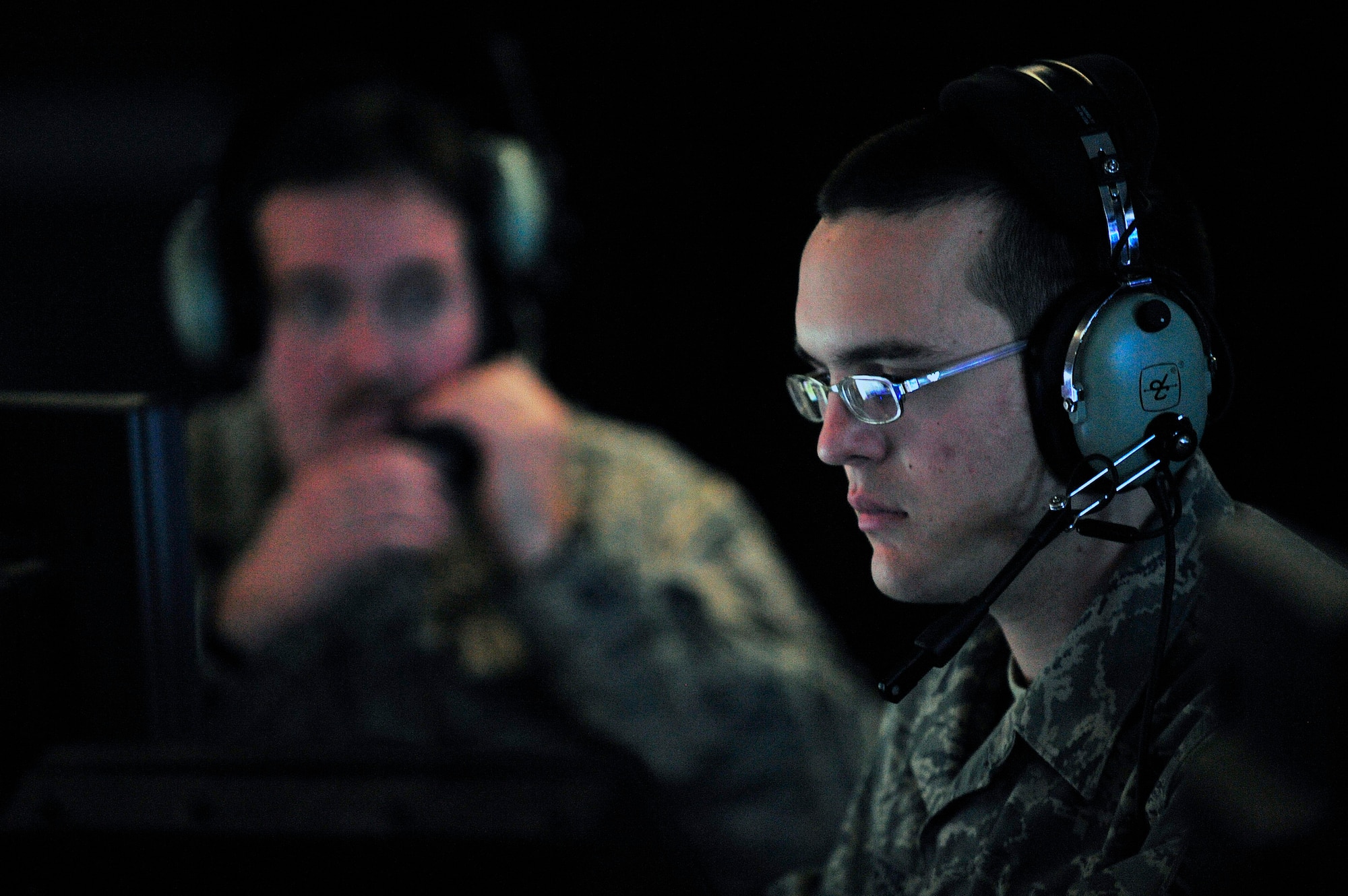 Senior Airman Daniel Shaub concentrates on a screen depicting Iraqi air space in the Control Response Center Jan. 29 at Joint Base Balad, Iraq. Members of the 727th Expeditionary Air Control Squadron are observing the sky and polling stations to give confidence to the Iraqi people and support them while they vote in the 2009 Iraqi provincial elections. Airman Shaub is a 727th EACS air surveillance technician deployed from the Kansas Air National Guard. (U.S. Air Force photo/Senior Airman Elizabeth Rissmiller) 
