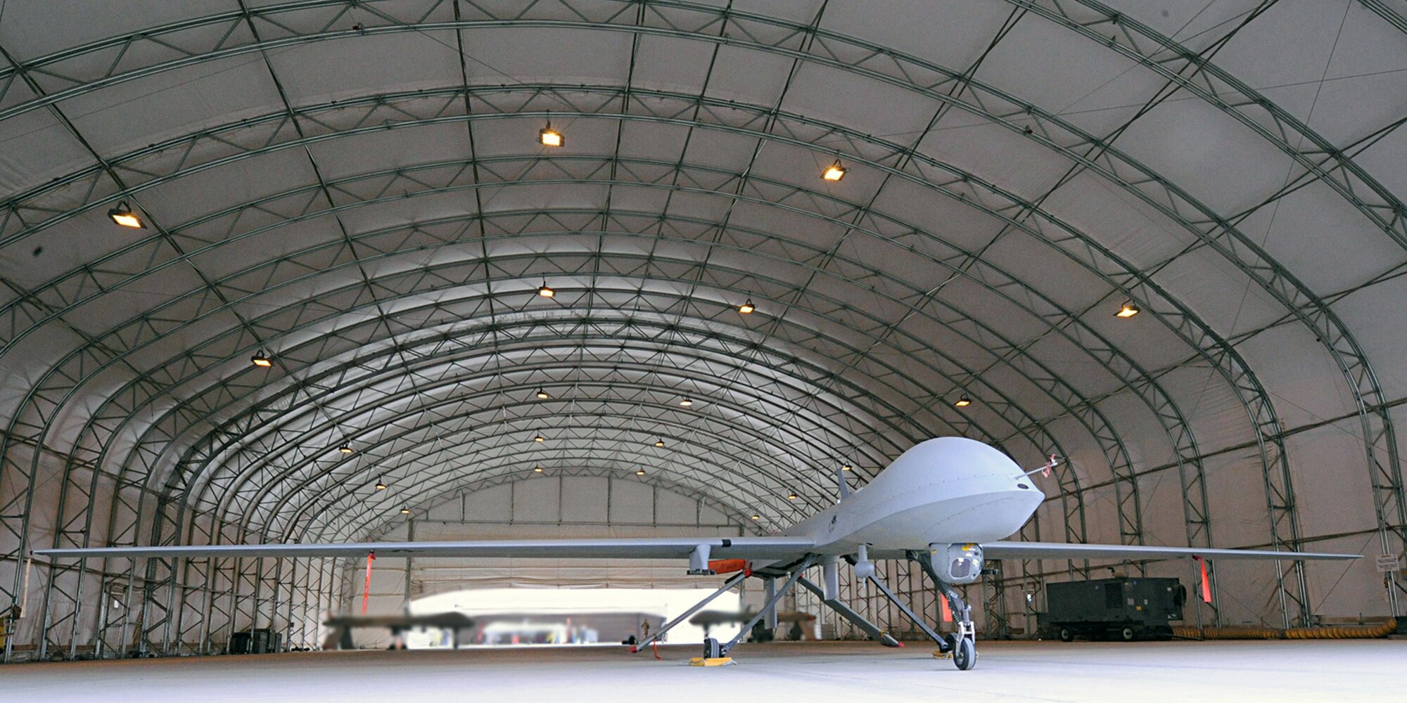 An MQ-1 Predator stands ready to take to the sky in support of the 2009 Iraqi provincial elections Jan. 30 at Joint Base Balad, Iraq. Fourteen of Iraq's 18 provinces will take part in the historic event, the first election since 2005. (U.S. Air Force photo/Senior Airman Tiffany Trojca)