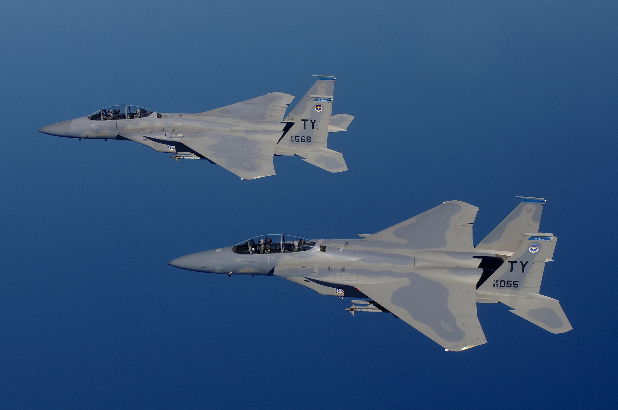 Mike Shiplett, foreground, and Reed Sorenson, background, receive incentive rides in F-15 Eagles from the 95th Fighter Squadron Jan. 23 at Tyndall Air Force Base, Fla. Mr. Sorenson, driver of Air Force sponsored #43 NASCAR, and his crew chief were at the base for the flights and to gain a better understanding of the Air Force and its global mission. (U.S. Air Force photo/Master Sgt. Scott Reed)