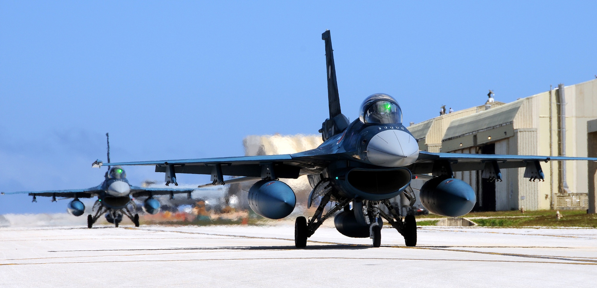 ANDERSEN AIR FORCE BASE, Guam - Japan Air Self Defense Force F-2 fighters taxi after arriving here Jan. 30 for the 2009 Cope North Exercise. This will be the tenth time the United States and Japan have held a Cope North exercise on Guam, and it will be the fourth time that the JASDF will use live ordinance. (U.S. Air Force photo by Airman 1st Class Courtney Witt)

