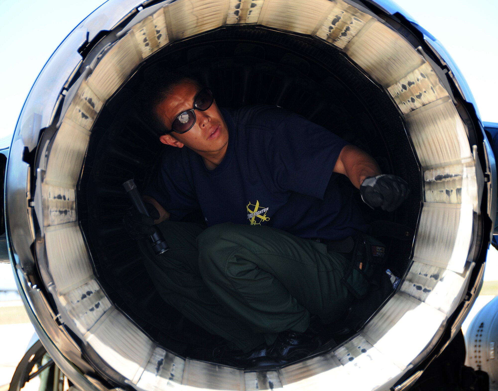 ANDERSEN AIR FORCE BASE, Guam - Japan Air Self Defense Force maintainer Staff Sgt. Hidaka Daisuke inspects the exhaust of a JASDF F-2 after its arrival here for participation in Cope North Jan 30. Cope North is designed to enhance U.S. and Japanese air operations in defense of Japan. (U.S. Air Force photo by Airman 1st Class Courtney Witt)

