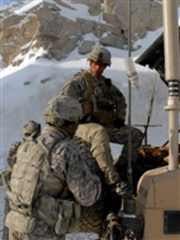 U.S. Army soldiers rest during a mission to check security efforts at Salang tunnel in the Hindu Kush mountain range in the Parwan province of Afghanistan on Jan. 30, 2009.  The soldiers are with Alpha Company, Division Special Troop Battalion, 101st Airborne Division.  