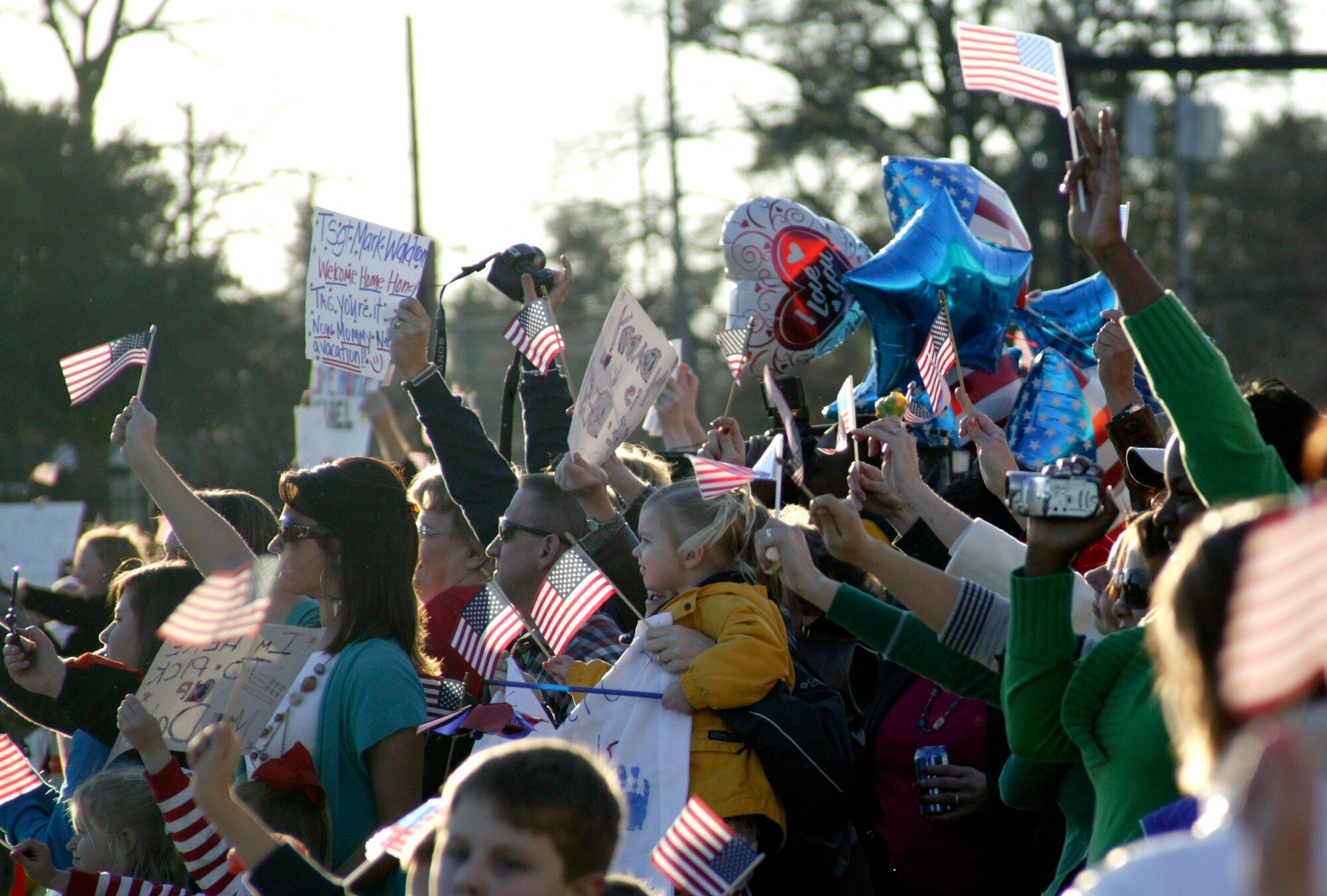 SHAW AIR FORCE BASE, S.C.-- Family and friends cheer as more than 300 Shaw Airmen, returning from a four-month deployment to Iraq, arrive by aircraft to Hangar 1200 at around 5 p.m. Jan. 31. (U.S. Air Force photo/Staff Sgt. Holly Brown)