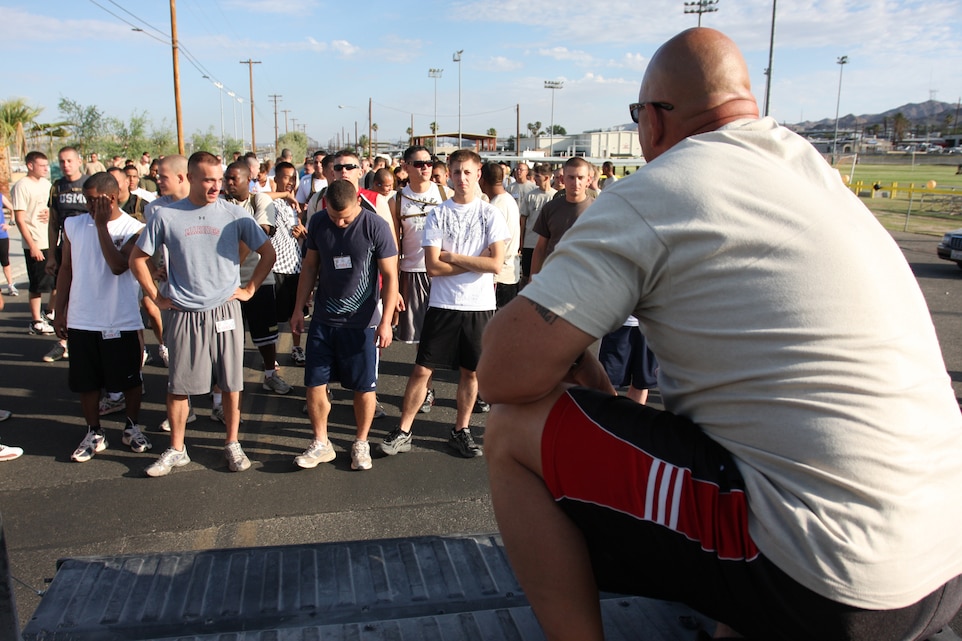 Sgt. Maj. Mark M. Geletko, the sergeant major of Headquarters Battalion, announces to runners the route of the first 5K Coyote Desert Fun Run beginning at Victory Field July 2.
