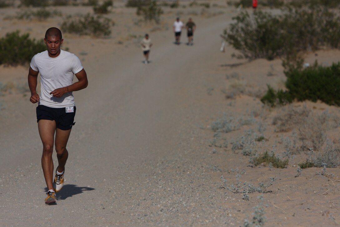 Lance Cpl. Noe Pena, a student with Company A, Marine Corps Communications-Electronics School, won first place for the 30-years-and-young category of the first 5K Coyote Desert Fun Run hosted by the Installation Personnel Administration Center of Headquarters Battalion July 2.