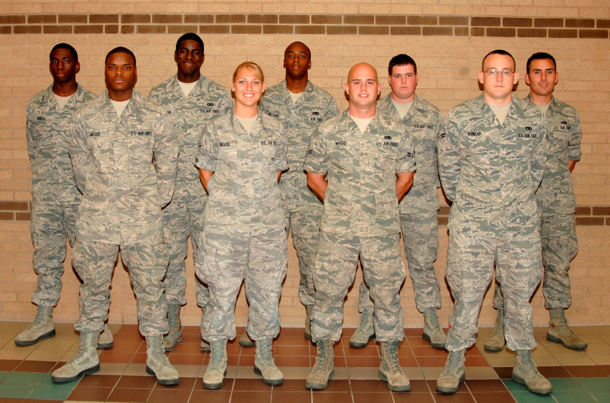 MCCONNELL AIR FORCE BASE, Kan. -- Congratulations to Team McConnell’s newest First Term Airman’s Center graduates who graduated June 30. Back row: Airmen 1st Class Brandon Terrell, Trevarius Mahan, Keith Williams, Michael Sala and
Christopher Lobsinger. Front row: Airman Traivon McGee, Gabrielle Biegler, Airmen 1st Class Matthew Myers and Jason Dunlap.
 (Photo by Senior Airman Laura Suttles)
