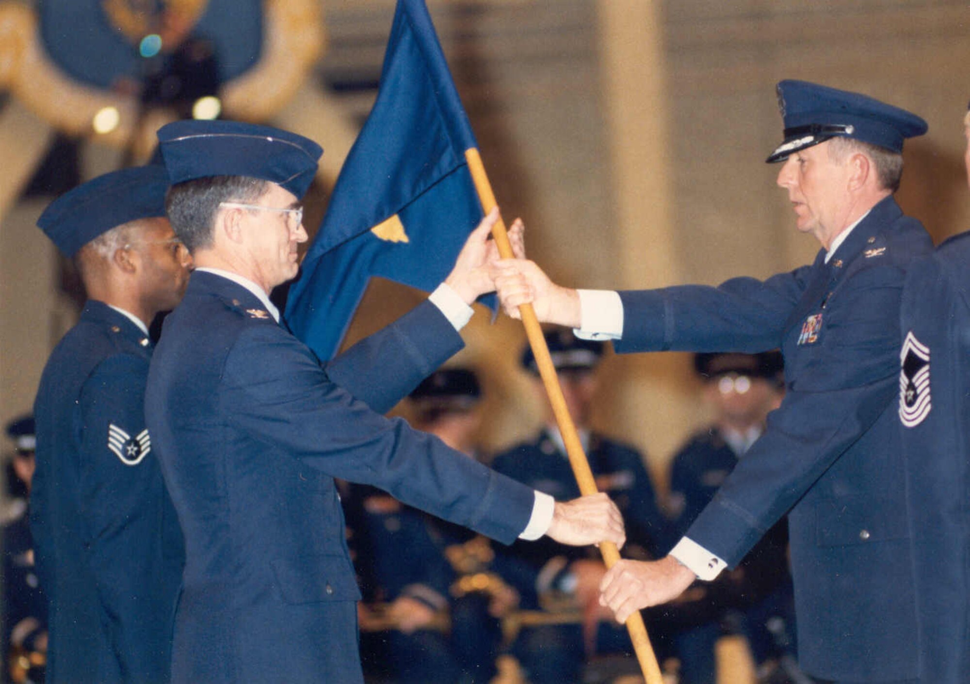 ELMENDORF AIR FORCE BASE, Alaska -- Col. Rodney Kelly passes the 3rd Logistics Group's guidon to Col. Douglas Stormo, formally activating the 3rd Logistic Group at Elmendorf Air Force Base December 19, 1991.(Courtesy photo)