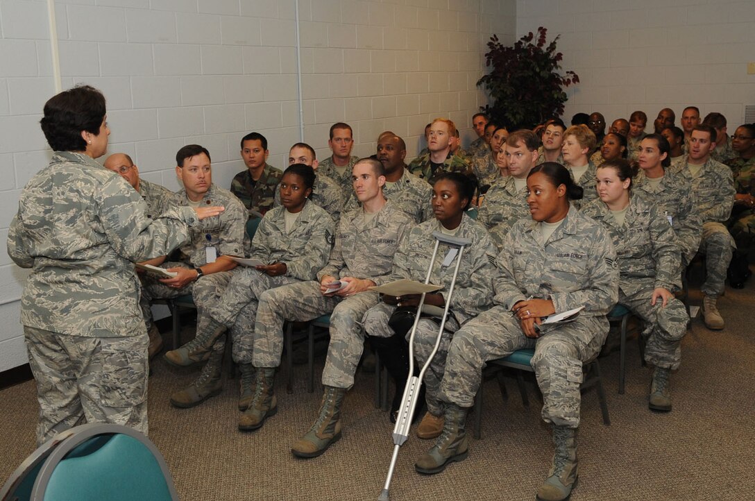 LANGLEY AIR FORCE BASE, Va. -- Maj. Sylvia Cruz, 1st Medical Group clinical nurse, briefs personnel on the side effects of their medication, during the first multi-facility Skeeter Swatt 2009 exercise here June 18. The exercise evaluated how well the 1st MDG coordinated with local emergency management organizations to dispense medication following a simulated Anthrax outbreak. (U.S. Air Force photo/Senior Airman Ashley Hawkins)