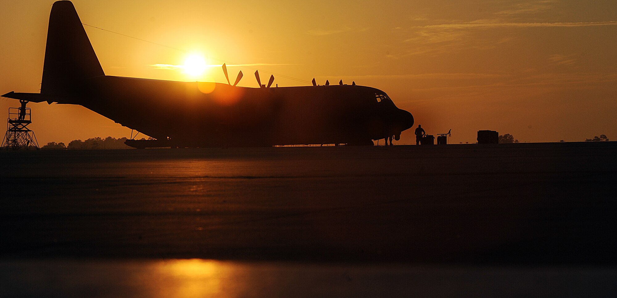 MOODY AIR FORCE BASE, Ga. -- Airmen perform a preflight inspection on a HC-130P Combat King here July 1 to ensure the aircraft is prepared to deploy to Australia. The aircraft will be transporting Airmen to Talisman Saber, one of the world's largest exercises. (U.S. Air Force photo by Airman 1st Class Joshua Green)
