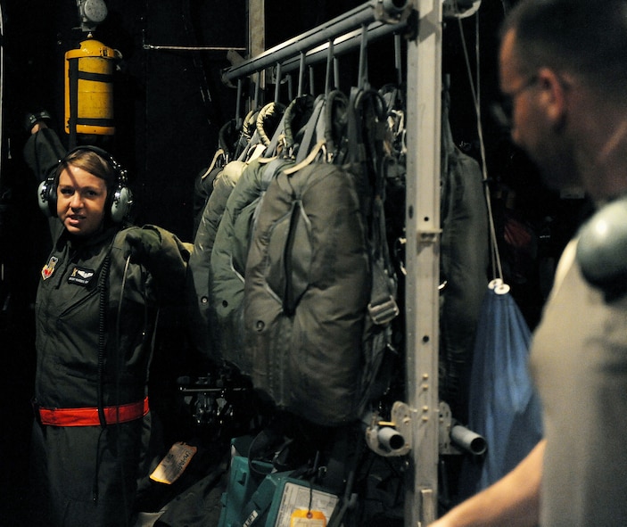 MOODY AIR FORCE BASE, Ga. -- Staff Sgt. Rebecca Rhodes, 71st Rescue Squadron
loadmaster, acknowledges an area that she has prepared during a preflight inspection on a HC-130P Combat King here July 1. Sergeant Rhodes performed the task in support of the Airmen heading to Talisman Saber, a multinational exercise held in Australia. (U.S. Air Force photo by Airman 1st Class Joshua Green)

