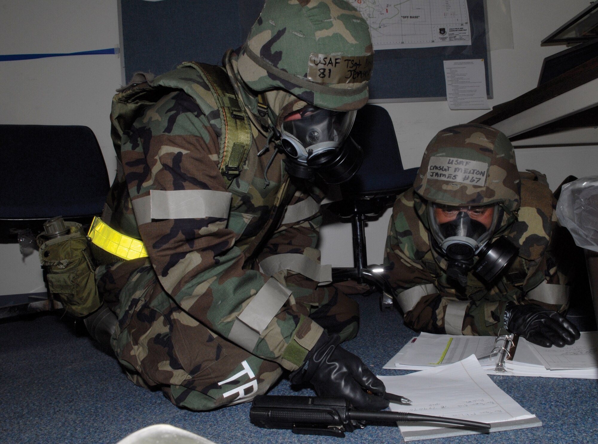 Tech. Sgt. Brian Jensen, 133rd Maintenance Squadron and Chief Master Sgt. James Melton, 133rd Aircraft Maintenance Squadron, assign members to Post Attack Reconnaissance (PAR) teams during Readiness Safeguard at Volk Field, Wis. on May 16, 2009.  Hundreds of men and women from the Minnesota Air National Guard unit joined others from Scott Air Force Base, Illinois for Readiness Safeguard in preparation for an Operational Readiness Inspection. USAF Official photo by Technical Sgt. Erik Gudmundson.(Released)