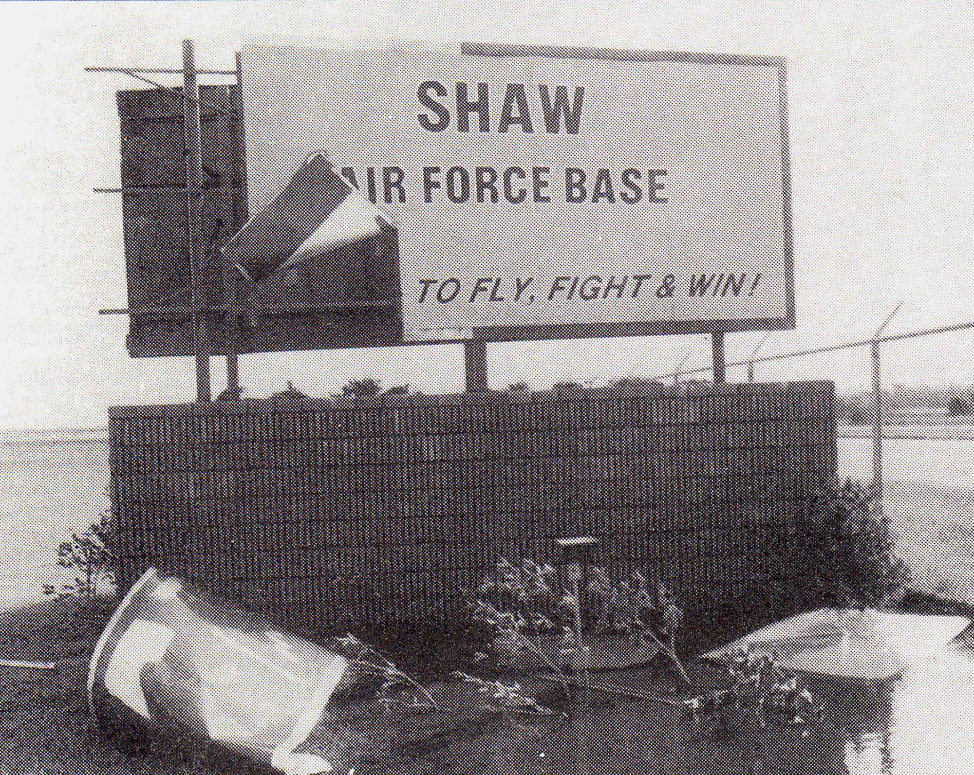 SHAW AIR FORCE BASE, S.C. -- Shown is damage to the Shaw AFB Main Gate sign after Hurricane Hugo passed through South Carolina the morning of Sept. 22, 1989. No deaths or serious injuries were reported as a result of the storm. Damage estimates to Shaw totaled to almost $47 million dollars. (Courtesy of Airman Magazine)