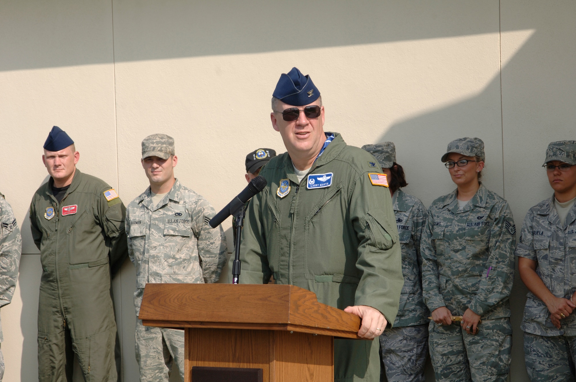 Col.  Lawrence M. Martin, Commander of the 6th Air Mobility Wing speaks at the ribbon cutting and dedication ceremony of the new command post on 19 June 2009.