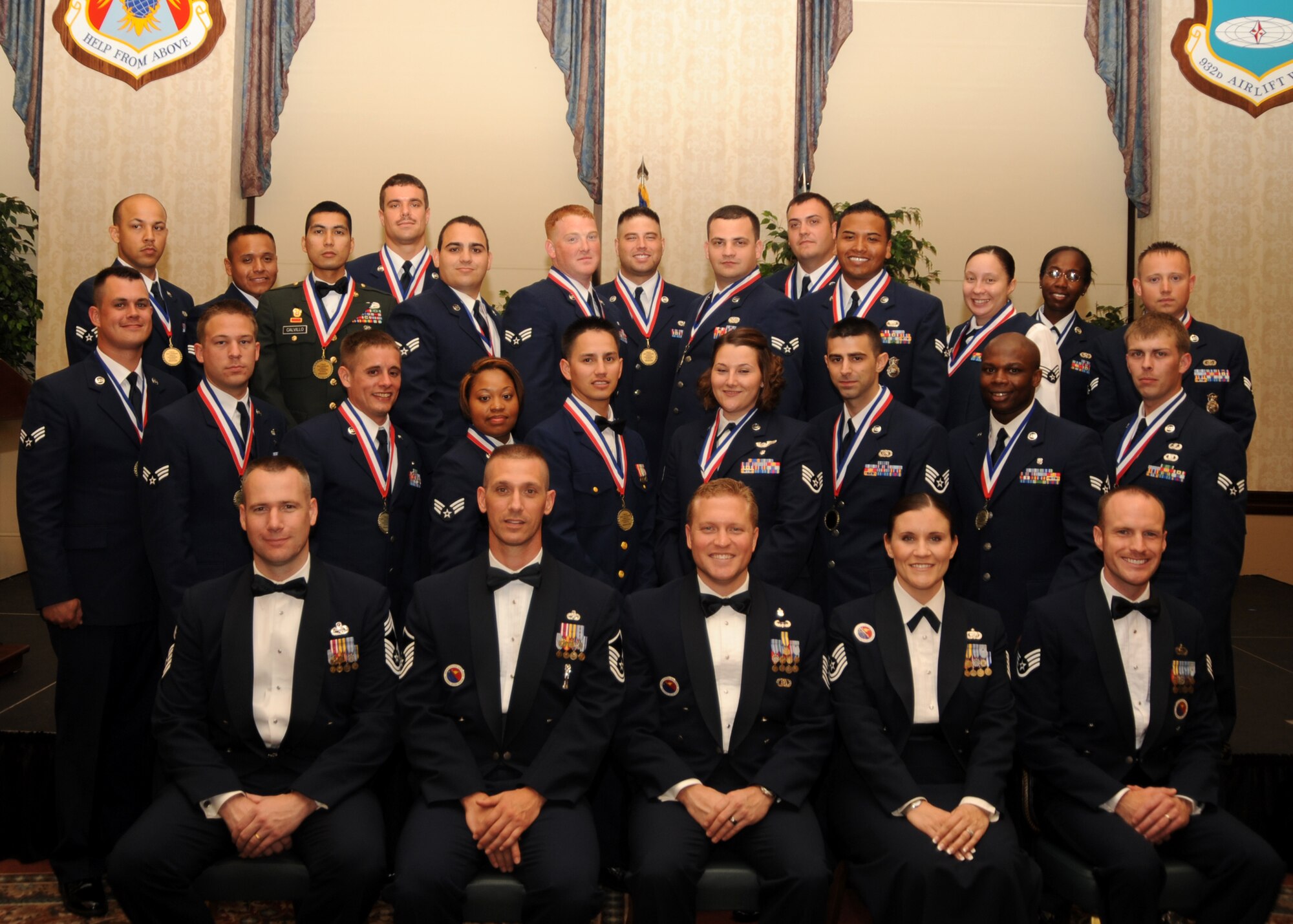 The Chief Master Sgt. of the Air Force Bud Andrews Airman Leadership Class 09-F graduated June 25. 

The graduates are: Senior Airman Jose Amores, 375th Logistics Readiness Squadron, Senior Airman George Anaya, 182nd Force Support Squadron, Senior Airman Shayla Bailey, 635th Supply Chain Management Group, Senior Airman Danielle Beasley, 932nd Services Flight, Staff Sgt. Matthew Blackwell, 375th Security Forces Squadron, Staff Sgt. Stephanie Boley, 375th Aeromedical Evacuation Squadron, Staff Sgt. Erik Brancaleone,  375th Communications Squadron, Army Spc. Michael Calvillo, U.S. Transportation Command, Staff Sgt. William Christian, 19th Air Support Operations Squadron, Senior Airman Adam Clark, 375th Civil Engineer Squadron, Senior Airman Joshua Cochran, 375th CS, Senior Airman Jesse Coleman, 375th CS, Senior Airman Bradley Diecker, 932nd AES, Coast Guard Petty Officer 3rd Class Adam Estrada, Electronic Support Detachment Memphis, Tenn., Senior Airman James Hamilton, 375th Medical Support Squadron, Senior Airman Gerardo Hernandez, 375th SFS, Senior Airman Emmanuel Lockhart, 375th FSS, Senior Airman Wes Parker, 375th MDSS, Senior Airman Jonas Prewitt, 375th Medical Operations Squadron, Senior Airman Brian Prunier, 182nd FSS, Senior Airman James Raxter, 19th Air Support 
Operations Squadron, Senior Airman Shalina Rios, 375th SFS, Senior Airman Michael Watson, 375th MDSS. 
Sergeant Brancaleone received the John L. Levitow Award, Sergeant Boley received the Distinguished Graduate and Leadership Award,  and Airman Prewitt received the Academic Achievement Award.(U.S. Air Force photo/ Airman 1st Class Wesley Farnsworth)
