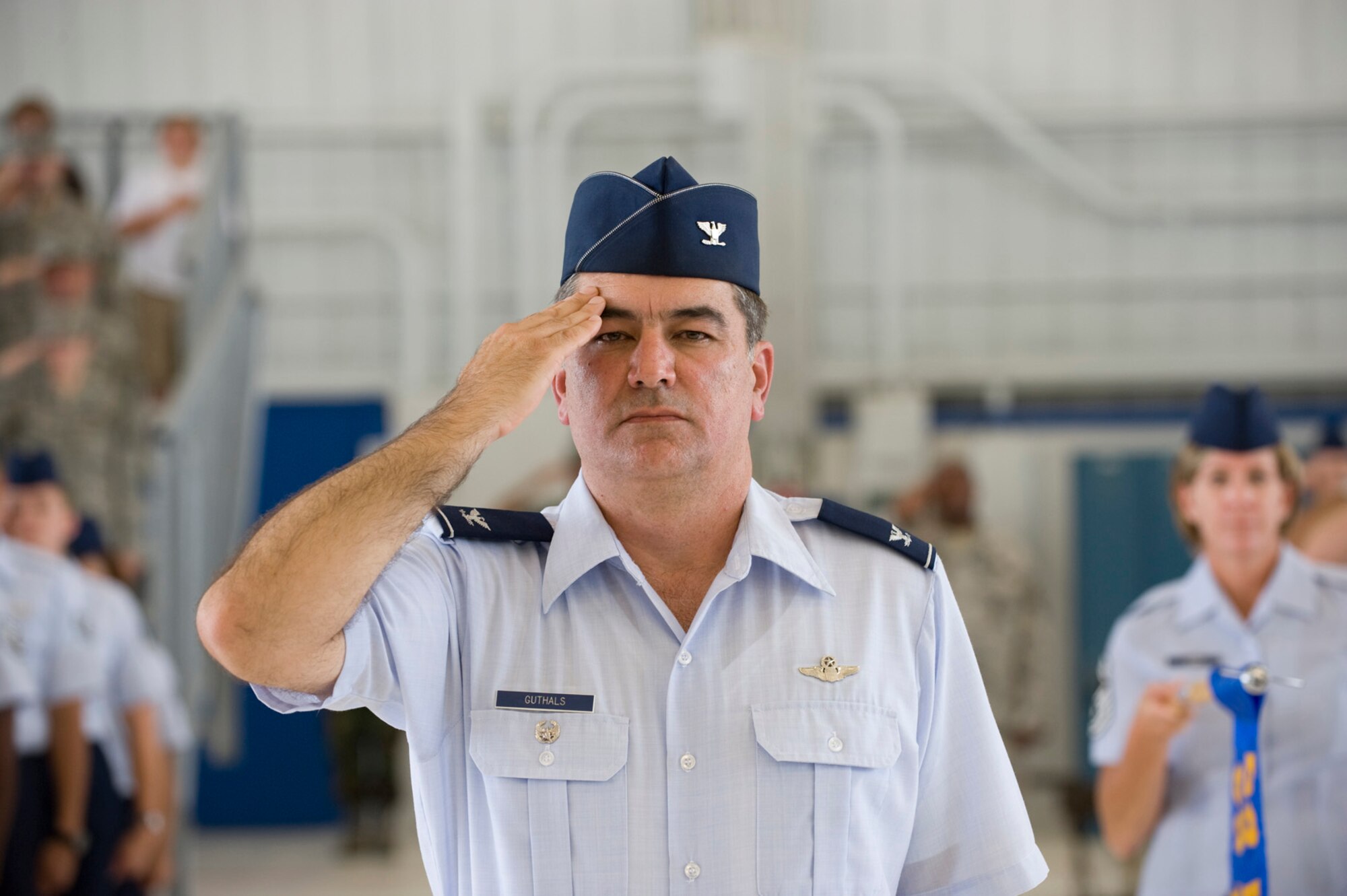Col. Mick Guthals, 53d Wing vice commander and acting as commander of troops, salutes during the 53d Wing assumption of command ceremony, June 24 at Eglin Air Force Base.  Col. Michael Gantt left his position as the vice commander of the 31st Fighter Wing to take command of the 2,000-person wing.  (U.S. Air Force photo/Greg Murray)