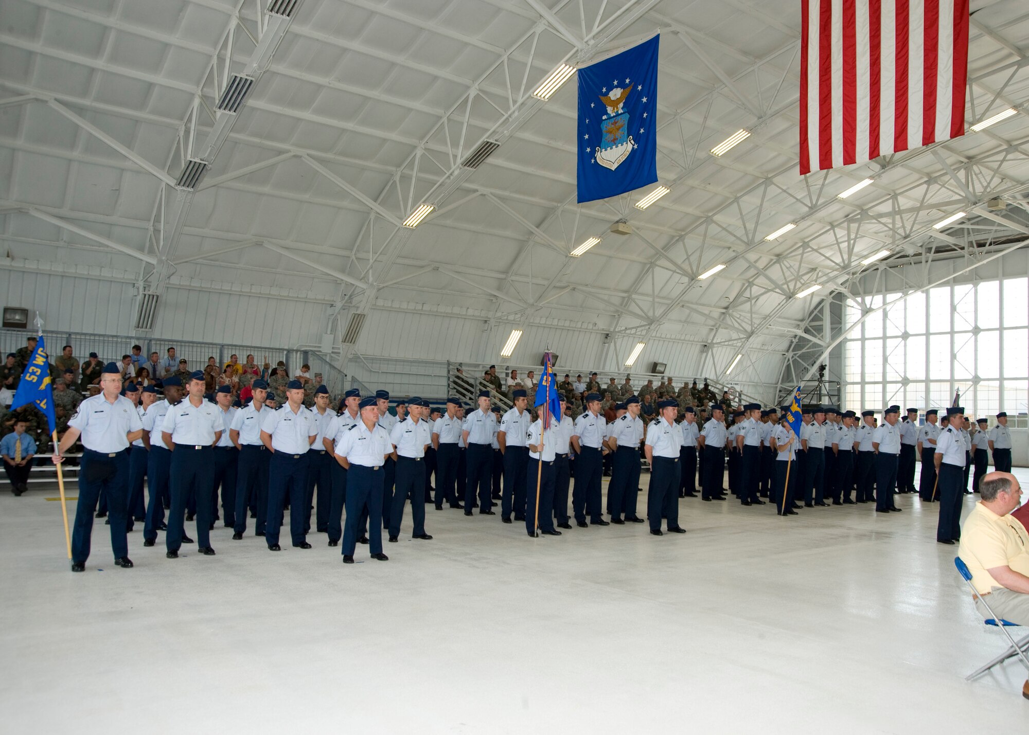 Members of the 53d Wing stand in formation by groups during the assumption of command ceremony June 24 at Eglin Air Force Base.  Col. Michael Gantt left his position as the vice commander of the 31st Fighter Wing to take command of the 2,000-person wing.  (U.S. Air Force photo/Greg Murray)