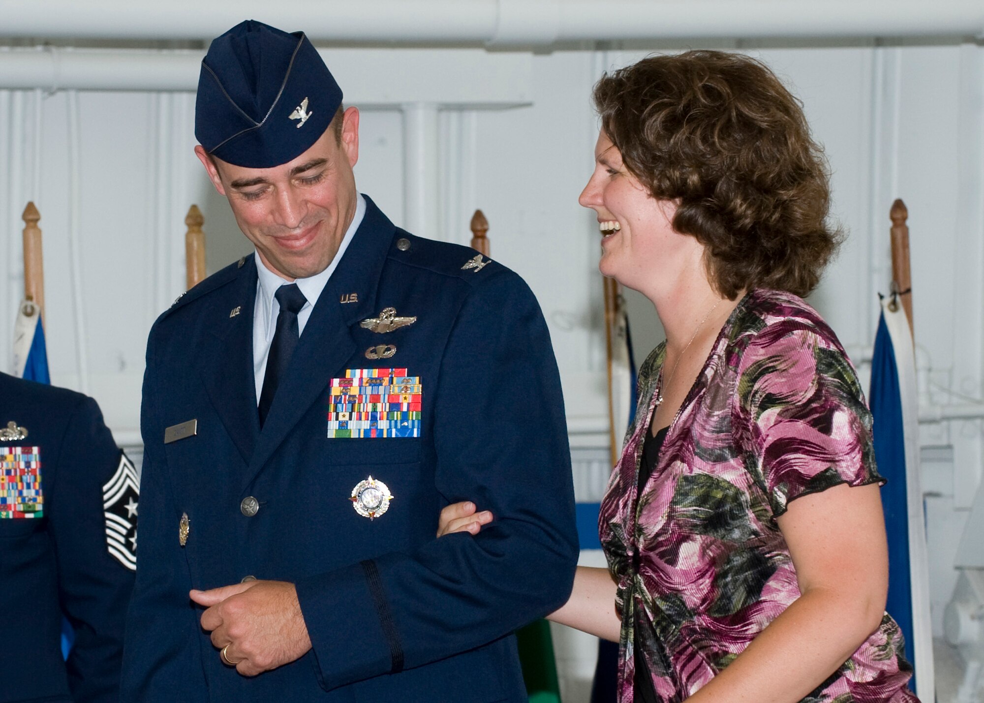 Col. Michael Gantt escorts his wife, Erica, after taking command of the 53rd Wing during a ceremony June 24 at Eglin Air Force Base.  Colonel Gantt left his position as the vice commander of the 31st Fighter Wing to take command of the 2,000-person wing.  (U.S. Air Force photo/Greg Murray)