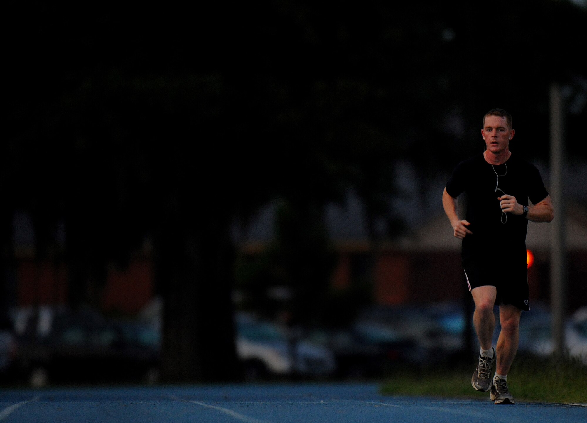 MOODY AIR FORCE BASE, Ga. -- A Moody Airman runs laps at the track here June 25. During the hot summer months, it is important to hydrate and protect yourself from the sun. (U.S. Air Force photo by Senior Airman Gina Chiaverotti)