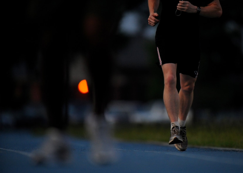MOODY AIR FORCE BASE, Ga. -- An Airman runs around the track before sunrise here June 25. Many Airmen spend their own time keeping fit to fight. (U.S. Air Force photo by Senior Airman Gina Chiaverotti)