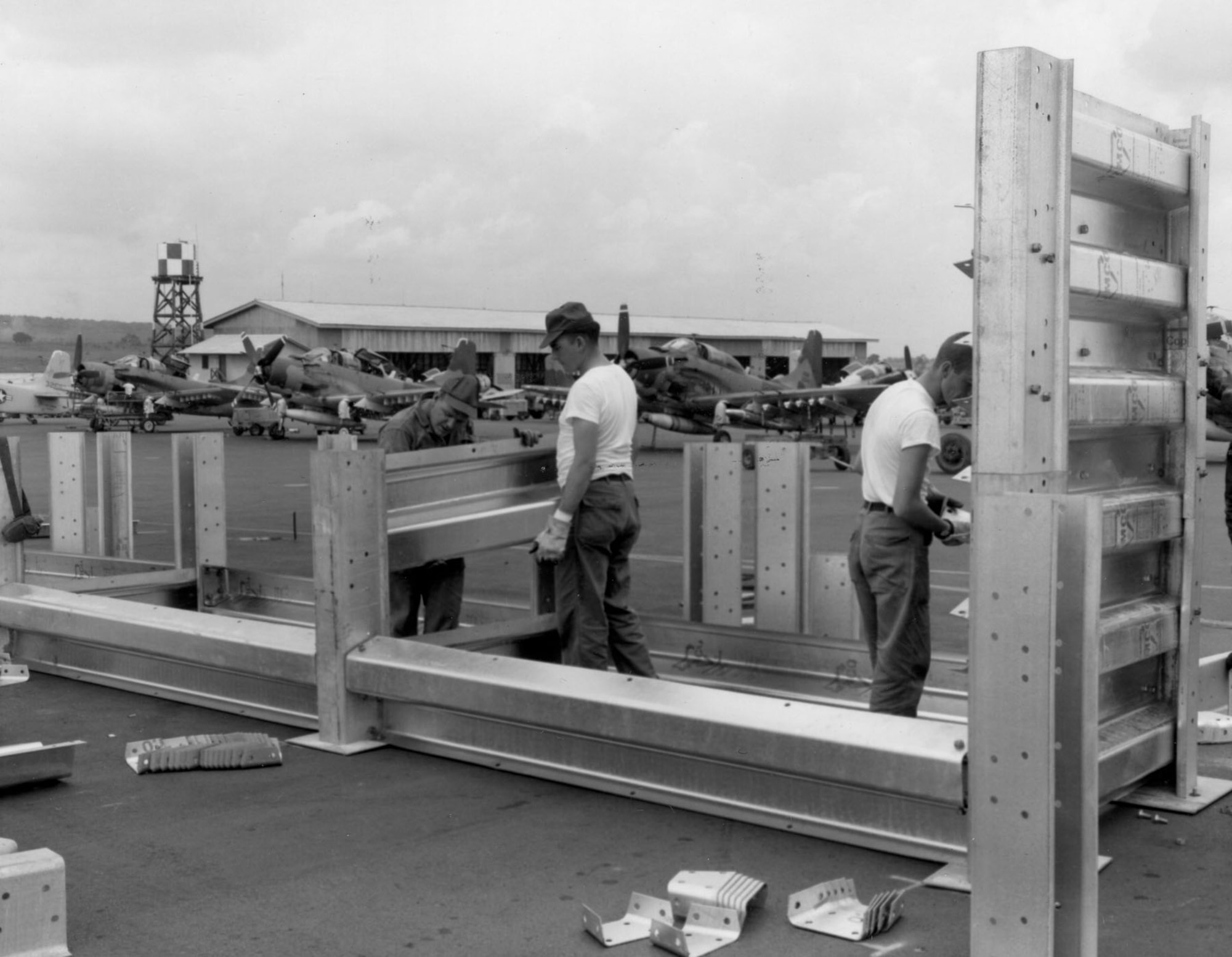 Prime BEEF Team constructing an aircraft revetment at Pleiku AB, South Vietnam, in April 1966. (U.S. Air Force photo)