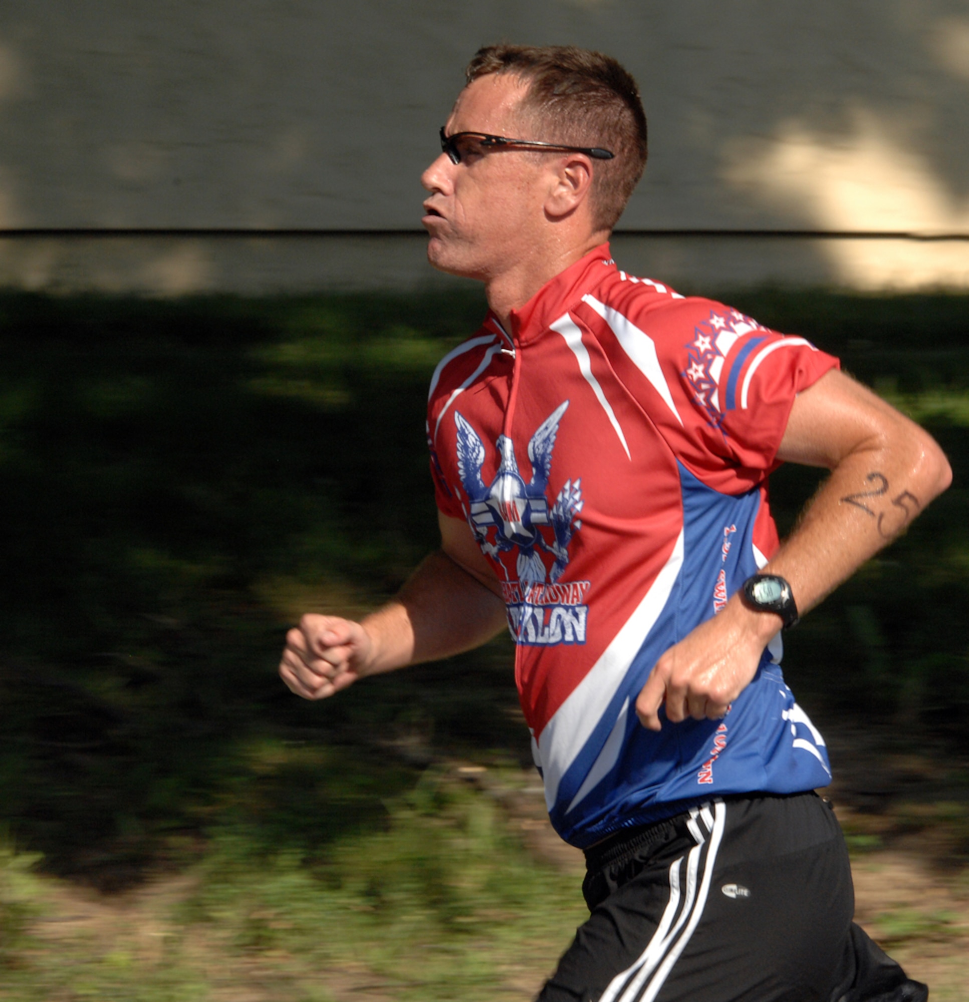 WHITEMAN AIR FORCE BASE, Mo. -  Capt Richard Reed.  509 FSS presents his face of determination during the 5K run portion of the Fitness Center Triathlon.  (U.S. Air Force photo/Master Sgt. Stan Coleman)