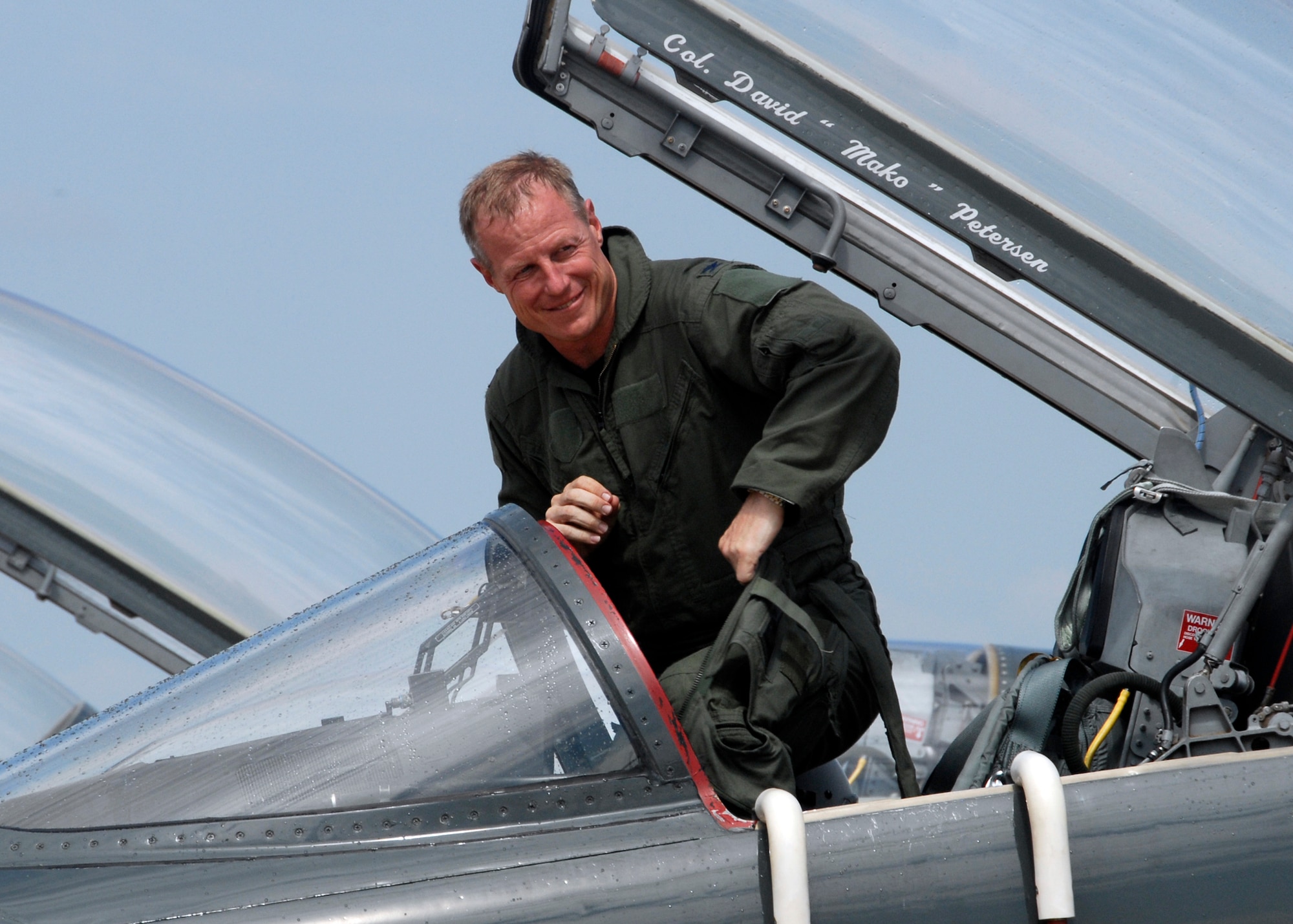 Col. David Petersen prepares to get out of the 80th Flying Training Wing commander's T-38 Talon June 30 following his final flight as the organization's leader. The colonel will head to Brussels, Belgium, now to serve as Deputy United States Military Representative to North Atlantic Treaty Organization Military Committee. (U.S. Air Force photo/Mike Litteken)