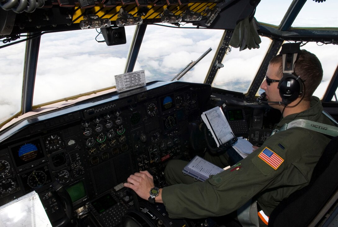 A pilot with the 109th Airlfit Squadron, 133rd Airlift Wing, flies a C-130 "Hercules" aircraft as part of a training mission at Volk Field, Wis. on May 16, 2009. Hundreds of men and women from the Minnesota Air National Guard unit joined others from Scott Air Force Base, Illinois for Readiness Safeguard in preparation for an Operational Readiness Inspection. USAF Official photo by Technical Sgt. Erik Gudmundson.(Released)