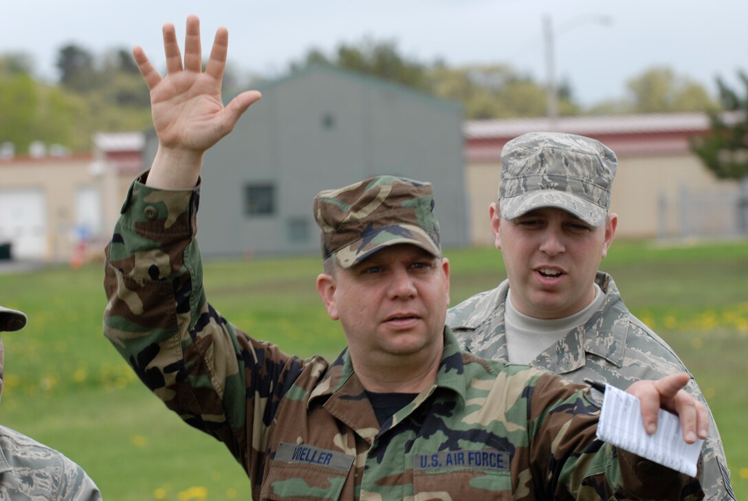 Master Sgt. Rick Voeller, 133rd Communications Flight, directs Airmen as a shelter manager during an evacuation exercise at Volk Field, Wis. on May 15, 2009. Hundreds of men and women from the Minnesota Air National Guard unit joined others from Scott Air Force Base, Illinois for Readiness Safeguard in preparation for an Operational Readiness Inspection. USAF Official photo by Technical Sgt. Erik Gudmundson.(Released)