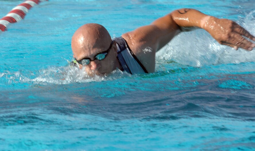 WHITEMAN AIR FORCE BASE, Mo. - Mr. Matthew Worden gives his all during the Whiteman Fitness Center Triathlon during the 438-meter swim.  (U.S. Air Force photo/Master Sgt. Stan Coleman)