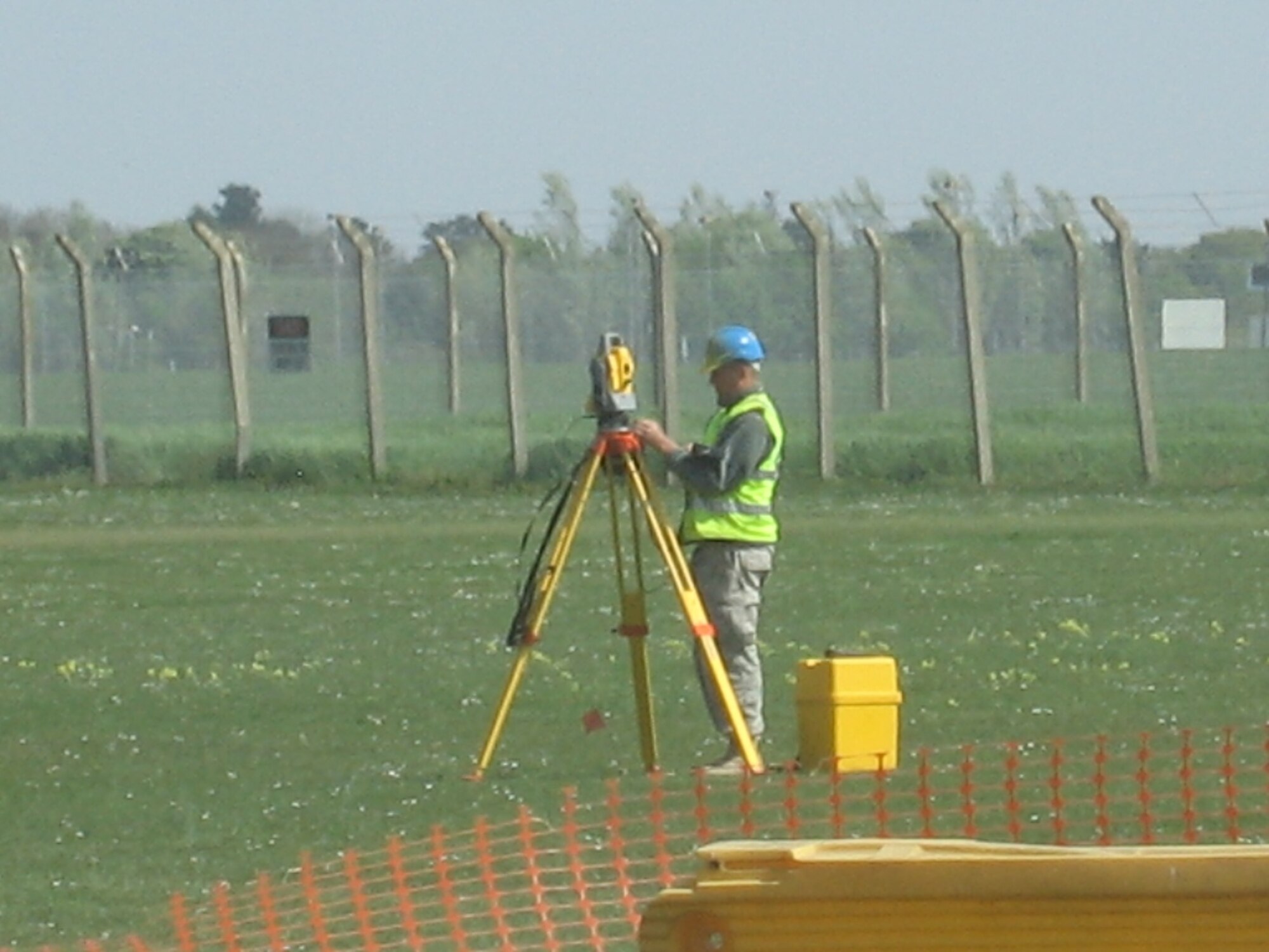 RAF FELTWELL, England--SSgt Brendan Allen, Engineering Craftsman, 86th Construction and Training Squadron Military Construction Flight, meticulously set's up the surveying equipment for the days work at RAF Feltwell. (USAF photo)

