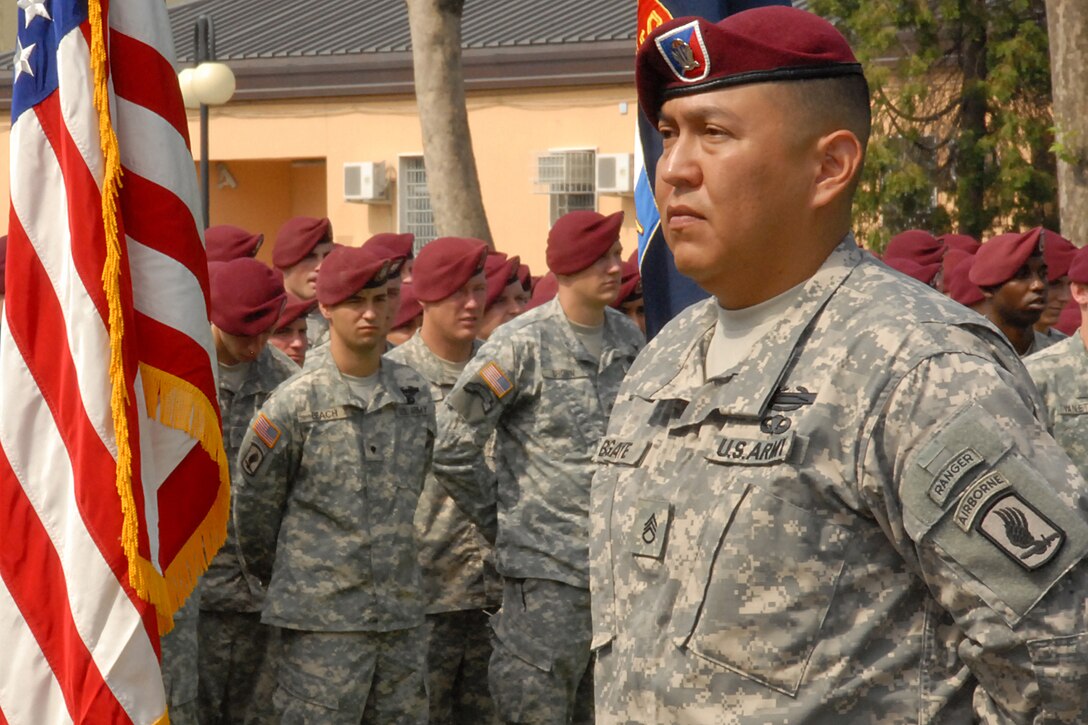 Army Staff Sgt. Conrad Begaye stands before fellow soldiers from 2nd Battalion, 503rd Infantry Regiment, during a ceremony in Vicenza, Italy, June 30, 2009. Begaye was awarded the Silver Star for his valorous actions during an enemy ambush Nov. 9, 2007, in Afghanistan’s Nuristan province. U.S. Army photo by Capt. Joseph Sanfilippo