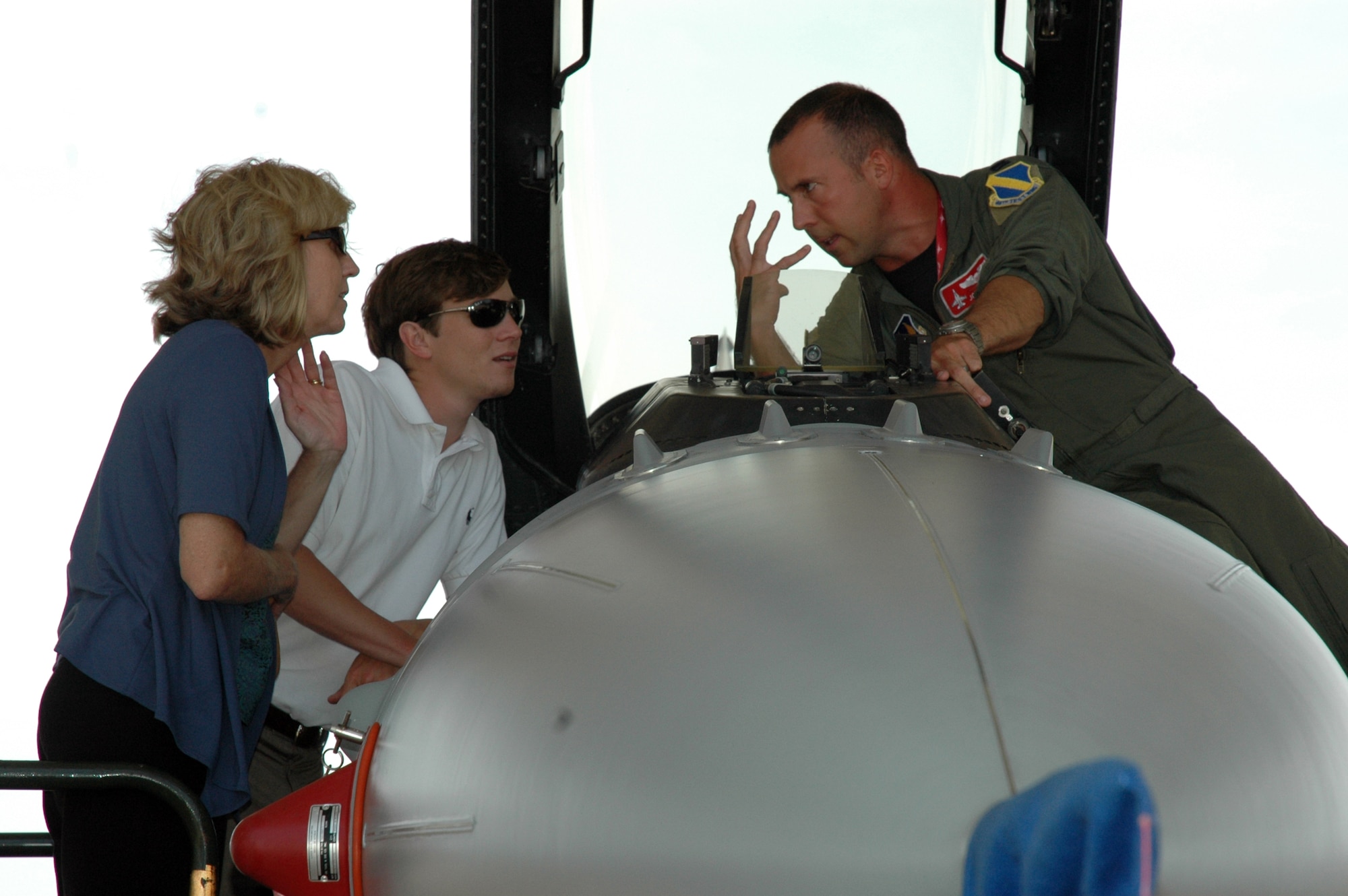 Capt. Andrew Avery, 58th Fighter Squadron pilot, gives Leadership Okaloosa students a view of an F-15 cockpit June 30. Students received a base-wide tour as part of their curriculum. The 10-month program, created by Northwest Florida State College and local-area chambers of commerce, educates and provides local business leaders with skills pertaining to community involvement and awareness. (U.S. Air Force Photo/Jasmine DeNamur)