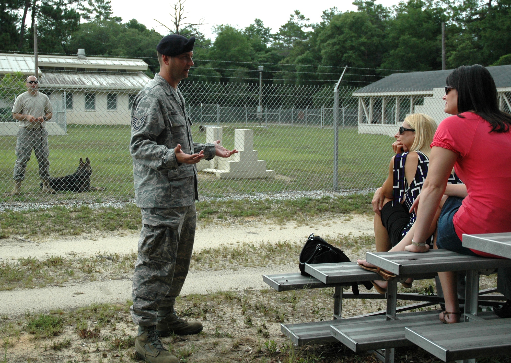 Tech Sgt. Dennis Dolce, 96th Security Forces Squadron military working dog NCO in charge, explains how military working dogs save lives to the 2009 Leadership Okaloosa class June 30. Students received a base-wide tour as part of their curriculum. The 10-month program, created by Northwest Florida State College and local-area chambers of commerce, educates and provides local business leaders with skills pertaining to community involvement and awareness. (U.S. Air Force Photo/Jasmine DeNamur)