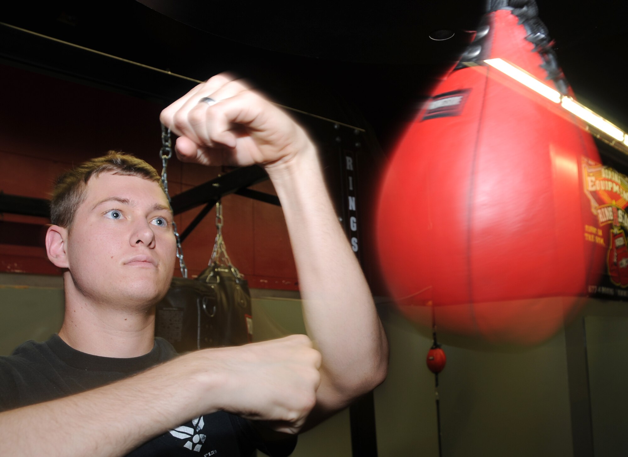 Stephen Showmaker, 81st Security Forces Squadron, works out on a speed bag in the recently reopened boxing room at the Triangle Fitness Center.  For more information, call 377-3056.  (U.S. Air Force photo by Kemberly Groue)