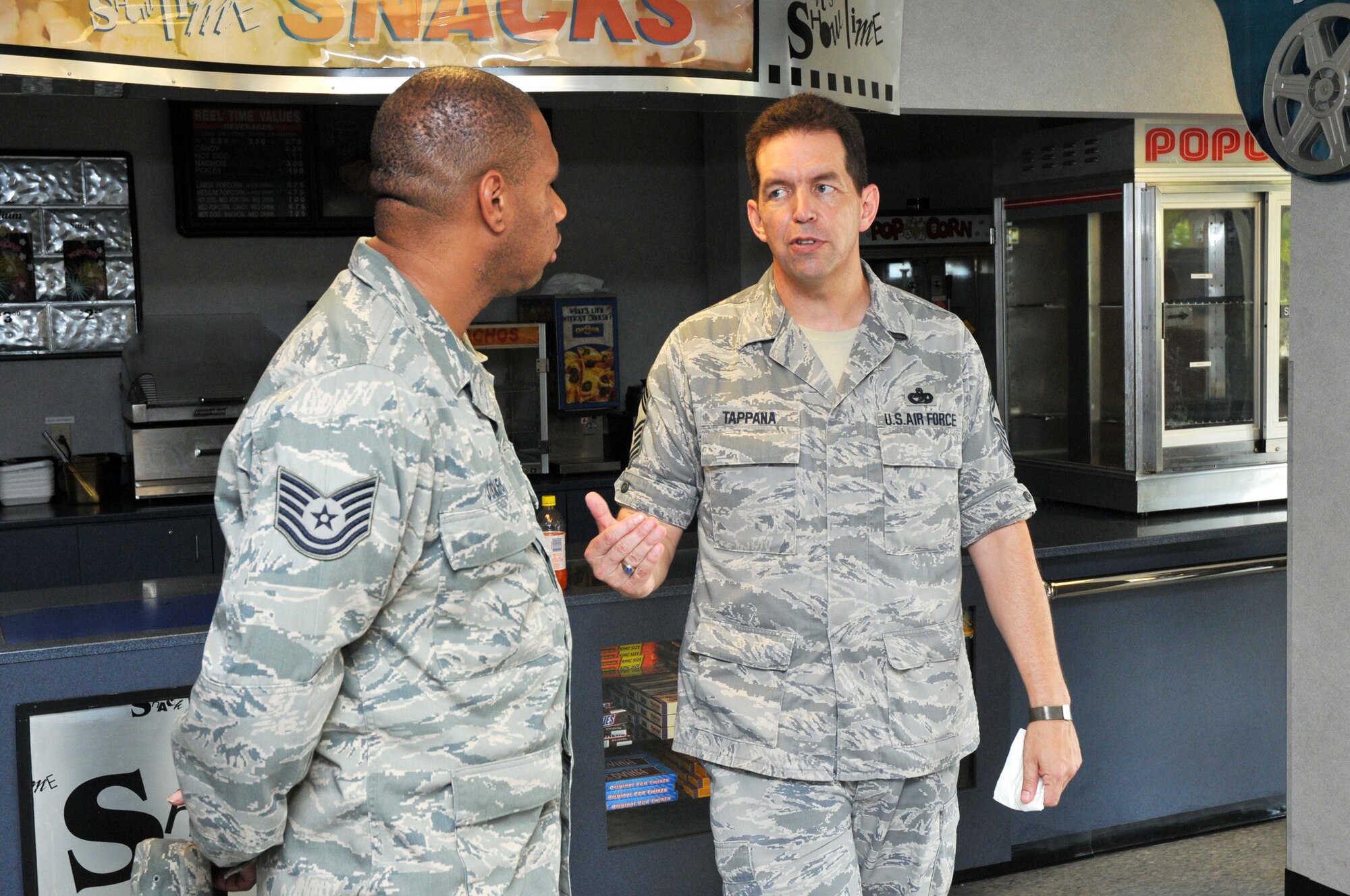 Tech. Sgt. Taiwan Jones, 81st Training Support Squadron, chats with Chief Master Sgt. Rob Tappana, command chief of Air Education and Training Command, after the chief’s enlisted call June 23 at Welch Auditorium.  Chief Tappana served as the 81st Training Wing’s command chief from November 2001-June 2003.  He assumed his current duties 11 months ago.  (U.S. Air Force photo by Adam Bond)