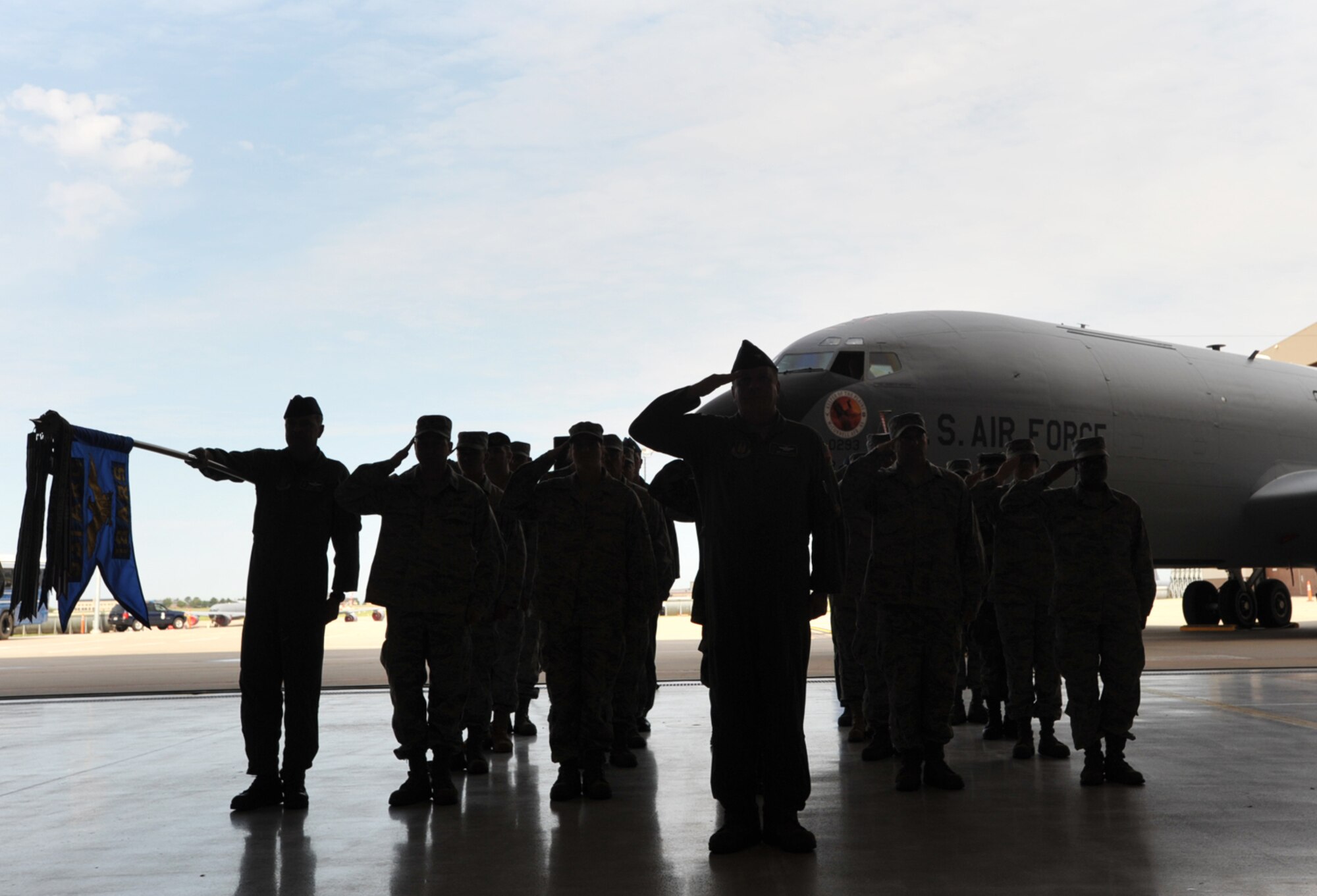 Reservists from the 931st Air Refueling Group hold their salutes during a change-of-command ceremony at McConnell Air Force Base, Kan., on July 2. Col. Jaime Crowhurst took command of the 22nd Air Refueling Wing, the 931st's host unit, during the ceremony. (U.S. Air Force photo/Tech. Sgt. Jason Schaap)