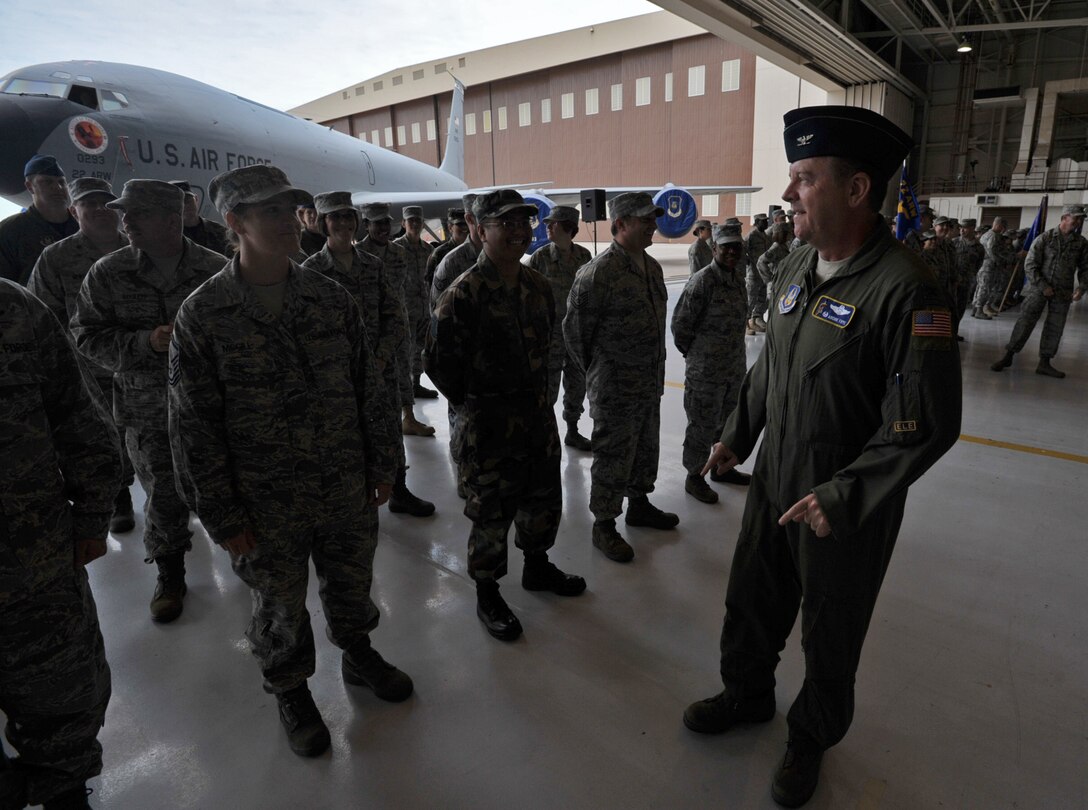 Col. Edsel A. "Archie" Frye Jr. jokes with some Reservists from the 931st Air Refueling Group before a change-of-command ceremony at McConnell Air Force Base, Kan., on July 2. Colonel Frye, commander of the 931st, led a formation of his Airmen during the ceremony. Col. Jaime Crowhurst, new commander of the 22nd Air Refueling Wing, the 931st's active-duty host unit, thanked Colonel Frye for the "total force" show of support. (U.S. Air Force photo/Tech. Sgt. Jason Schaap)