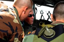 SHAW AIR FORCE BASE, S.C.-Captain Ryan Daugherty, 16th Airlift Squadron C-17 pilot, speaks to South Carolina Civil Air Patrol cadets on the capabilities of the C-17 aircraft July 1, 2009. CAP cadets toured Shaw AFB and took an incentive ride on a C-17 from Charleston AFB.(U.S. Air Force photo/Senior Airman Matt Davis)
