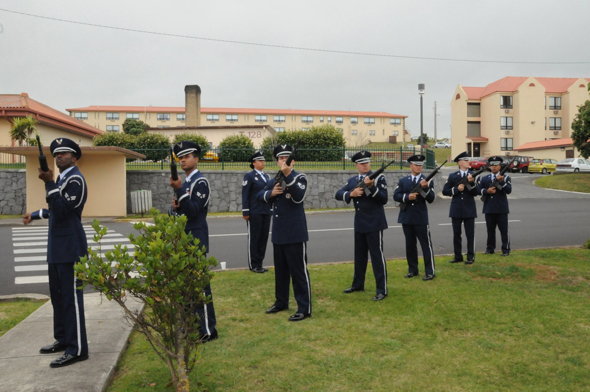 Members of the 65th Air Base Wing Honor Guard fire a volley during a twenty-one gun salute at the memorial service in honor of Senior Airman Amber Finnell, 65th Security Forces Squadron, at Lajes Field July 2. Airman Finnell was from East Tawas, Mich. and entered the Air Force in Feb. 2004.  She had been previously stationed at Minot AFB, N.D. and Sather AB, Baghdad, Iraq; she passed away on June 30, 2009.  (U.S. Air Force photo by Tech Sgt. Rebecca F. Corey)