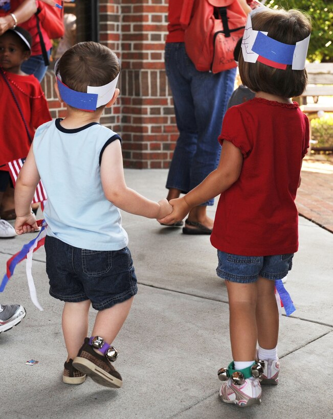 LANGLEY AIR FORCE BASE Va. -- Two Langley Child Development Center toddlers participate in the CDC's 4th of July parade here July 2 to kick off the holiday weekend. (U.S. Air Force photo/Airman 1st Class Jonathan Koob)