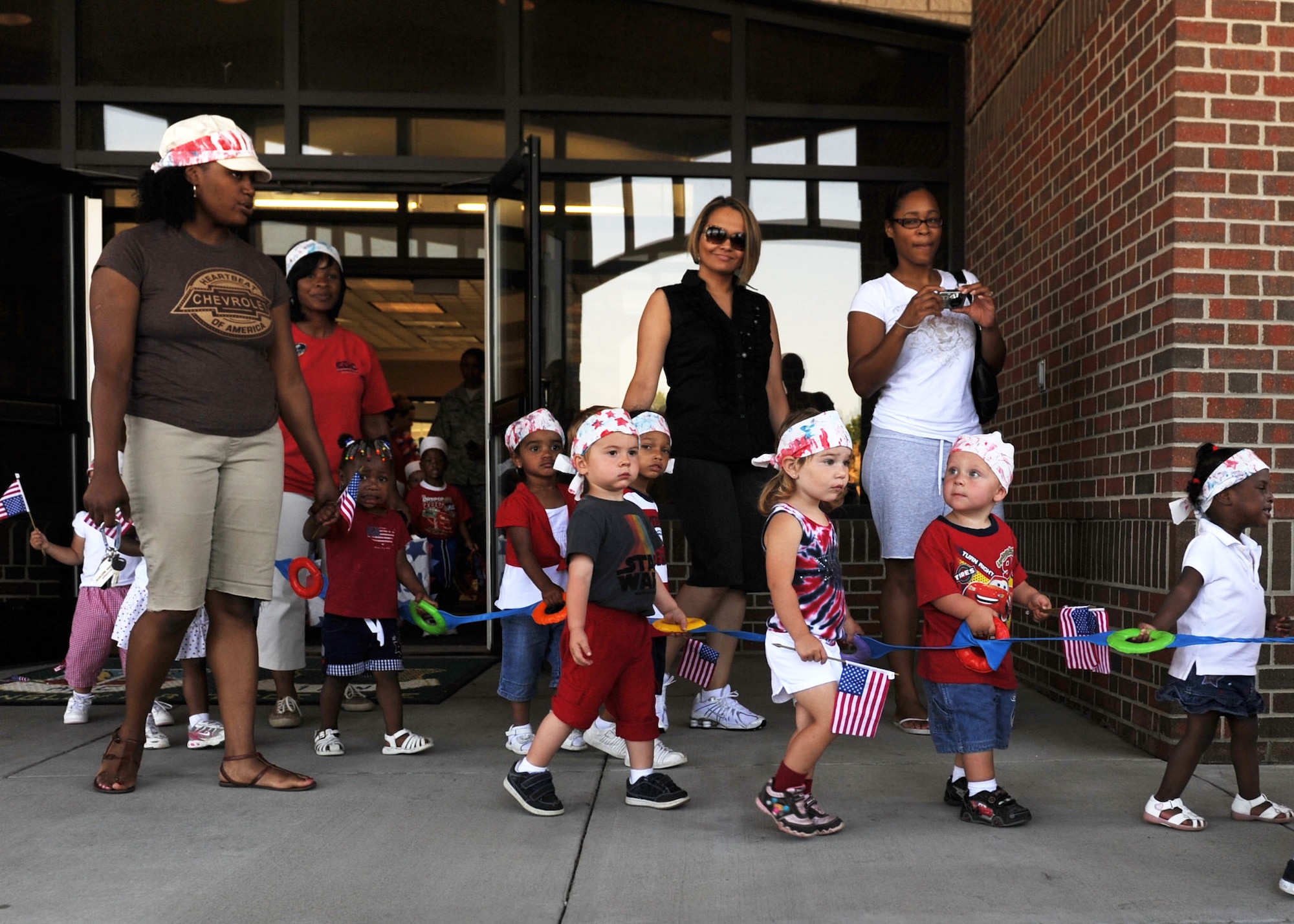 LANGLEY AIR FORCE BASE Va. -- A class of Langley Child Development Center toddlers participate in the CDC's 4th of July parade here July 2 to kick off the holiday weekend. (U.S. Air Force photo/Airman 1st Class Jonathan Koob)