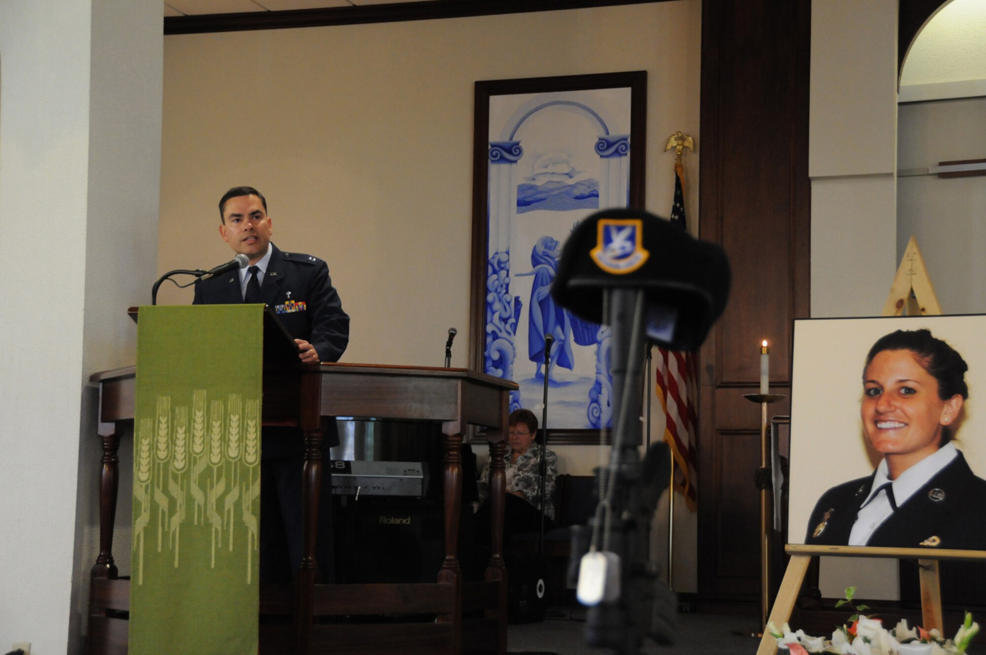Chaplain (Capt.) Ismael Rodriguez, 65th Air Base Wing chapel, gives the invocation at the memorial service in honor of Senior Airman Amber Finnell at Lajes Field July 2. Airman Finnell was from East Tawas, Mich. and entered the Air Force in Feb. 2004.  She had been previously stationed at Minot AFB, N.D. and Sather AB, Baghdad, Iraq; she passed away on June 30, 2009.  (U.S. Air Force photo by Tech Sgt. Rebecca F. Corey)