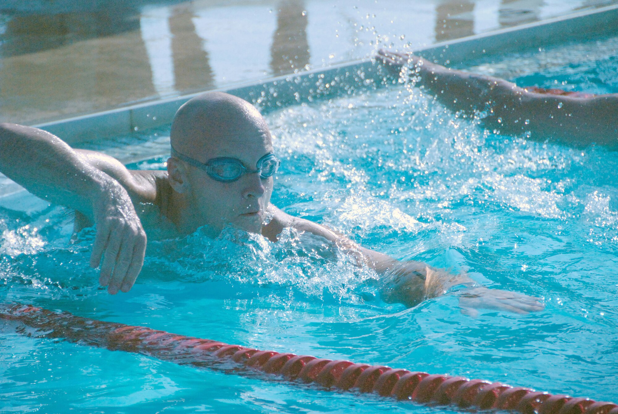 Tech. Sgt. John Straka takes off quickly for the 438-meter swim during a triathlon sponsored by the 509th Bomb Wing at Whiteman Air Force Base, Mo., June 27, 2009. Sergeant Straka is a reservist in the 442nd Aircraft Maintenace Squadron, part of the 442nd Fighter Wing,  based at Whiteman. (U.S. Air Force photo/Senior Airman Danielle Wolf)